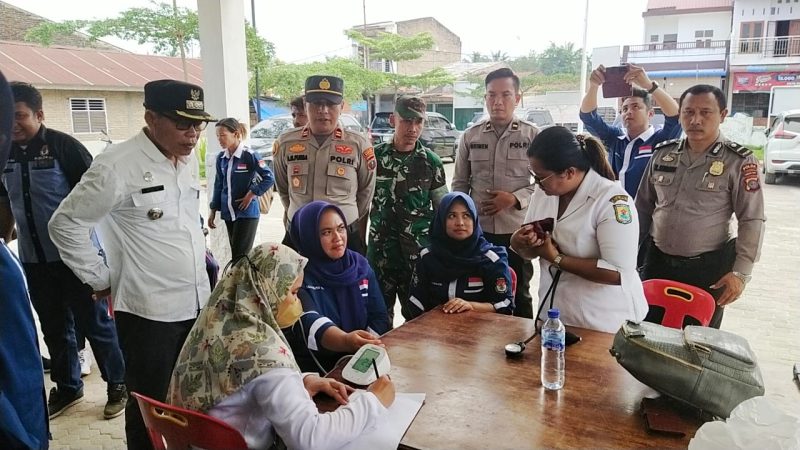 Pastikan Kesehatan, Polsek Kotarih Gelar Pemeriksaan Kesehatan Petugas PPK jelang Rapat Pleno
